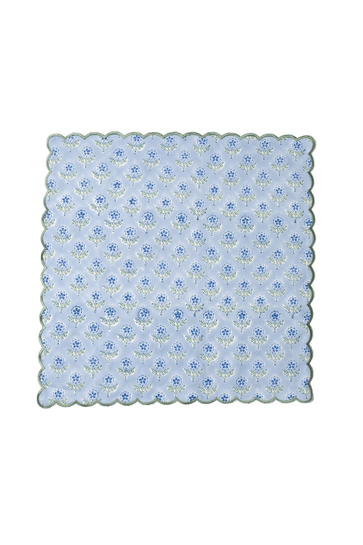 Blue scallop-edge napkin with repeating embroidered floral blockprint motif