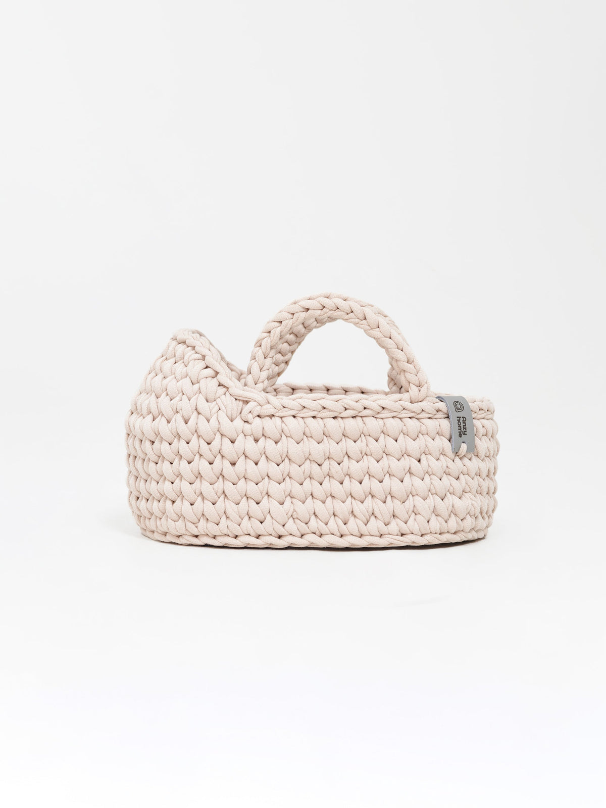 Mini doll moses basket, ecru woven basket with curved handle and side label