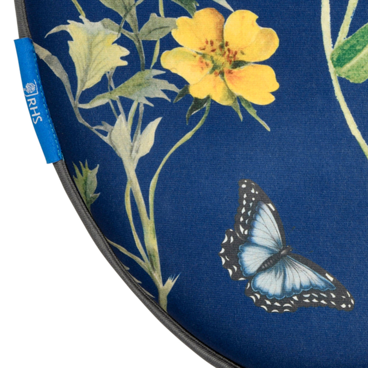 Close-up of blue kneeler fabric with yellow flower and butterfly motif
