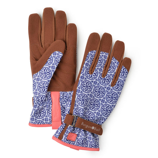 Garden gloves with brown suede palms, blue-and-white patterned back, and coral cuff accents