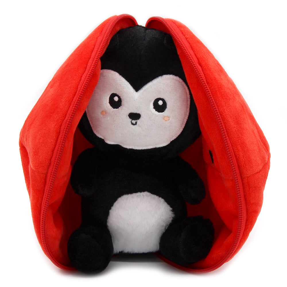 Open red tomato plush with black ladybug inside, white face and belly patch