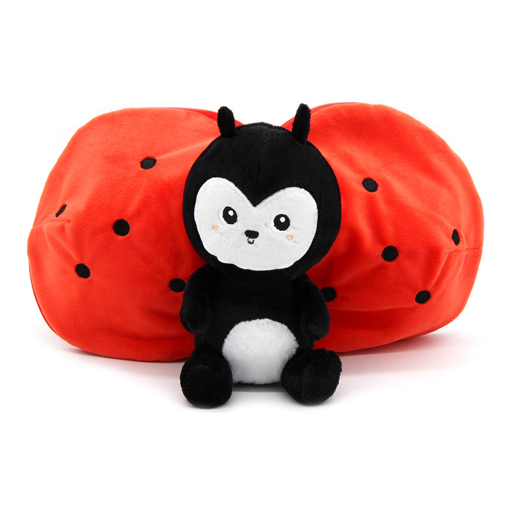 Red tomato-shaped plush with black ladybug face, dots on wings, small plush body