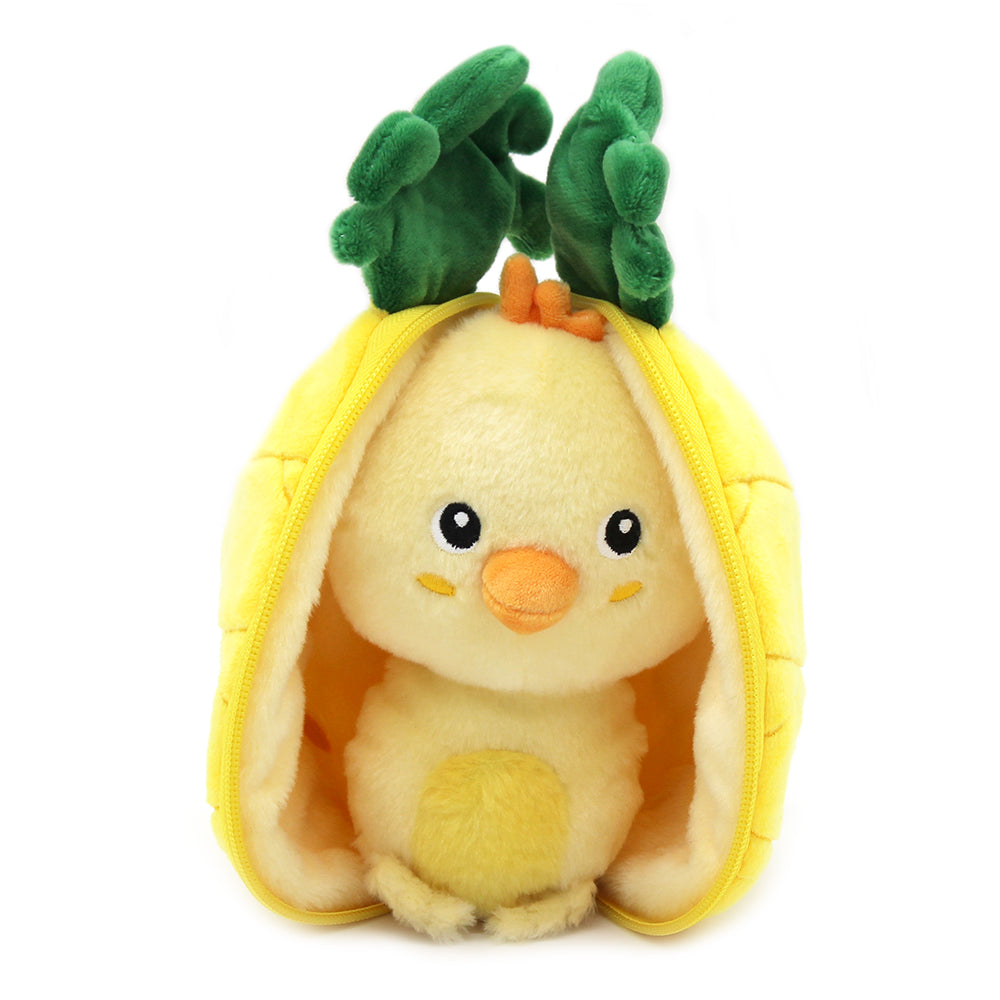 Chick plush inside open pineapple pouch, yellow shell and green leaf crown