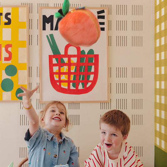 Plush turtle pouch hanging overhead for kids, with orange body and green shell