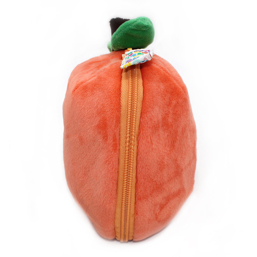 Back view of peach orange plush turtle pouch with orange zipper and green leaf