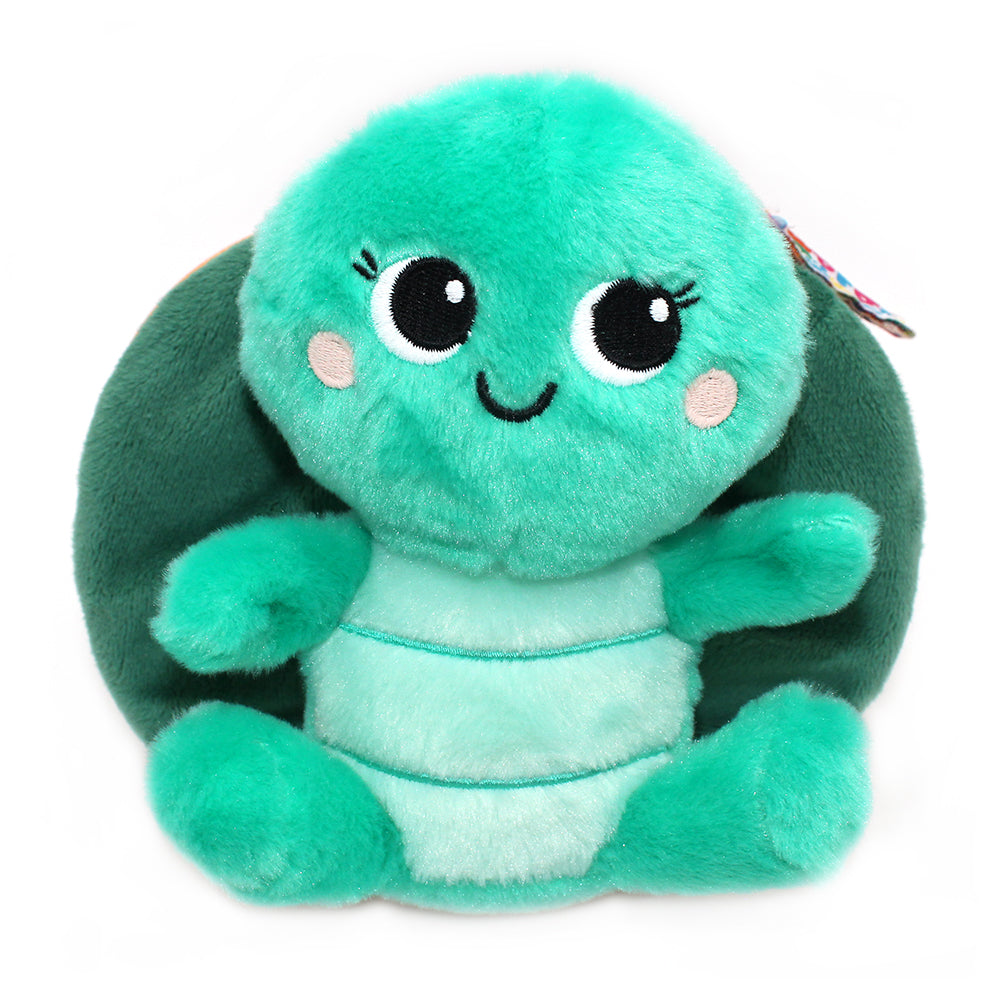 Green plush turtle character with big eyes, tiny arms, and stitched smile
