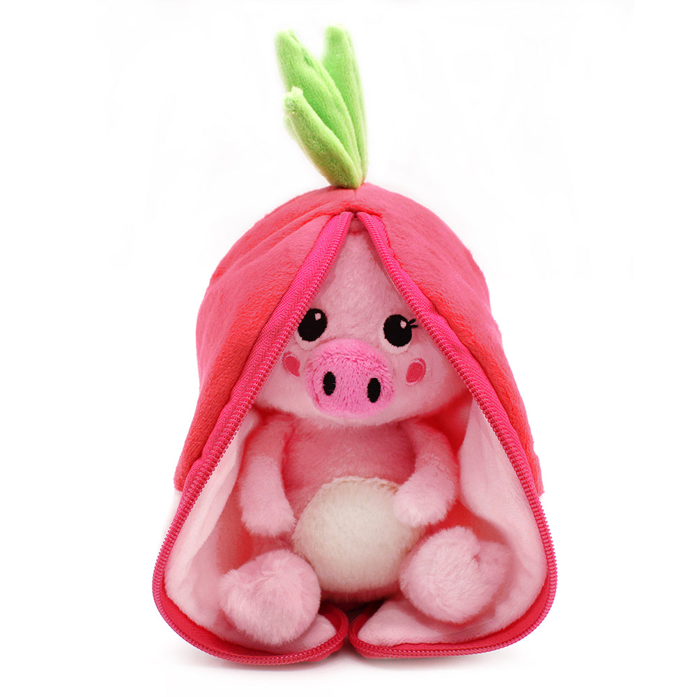 Close-up plush radish pod with pink pig face, green leaf top, fuzzy stuffing