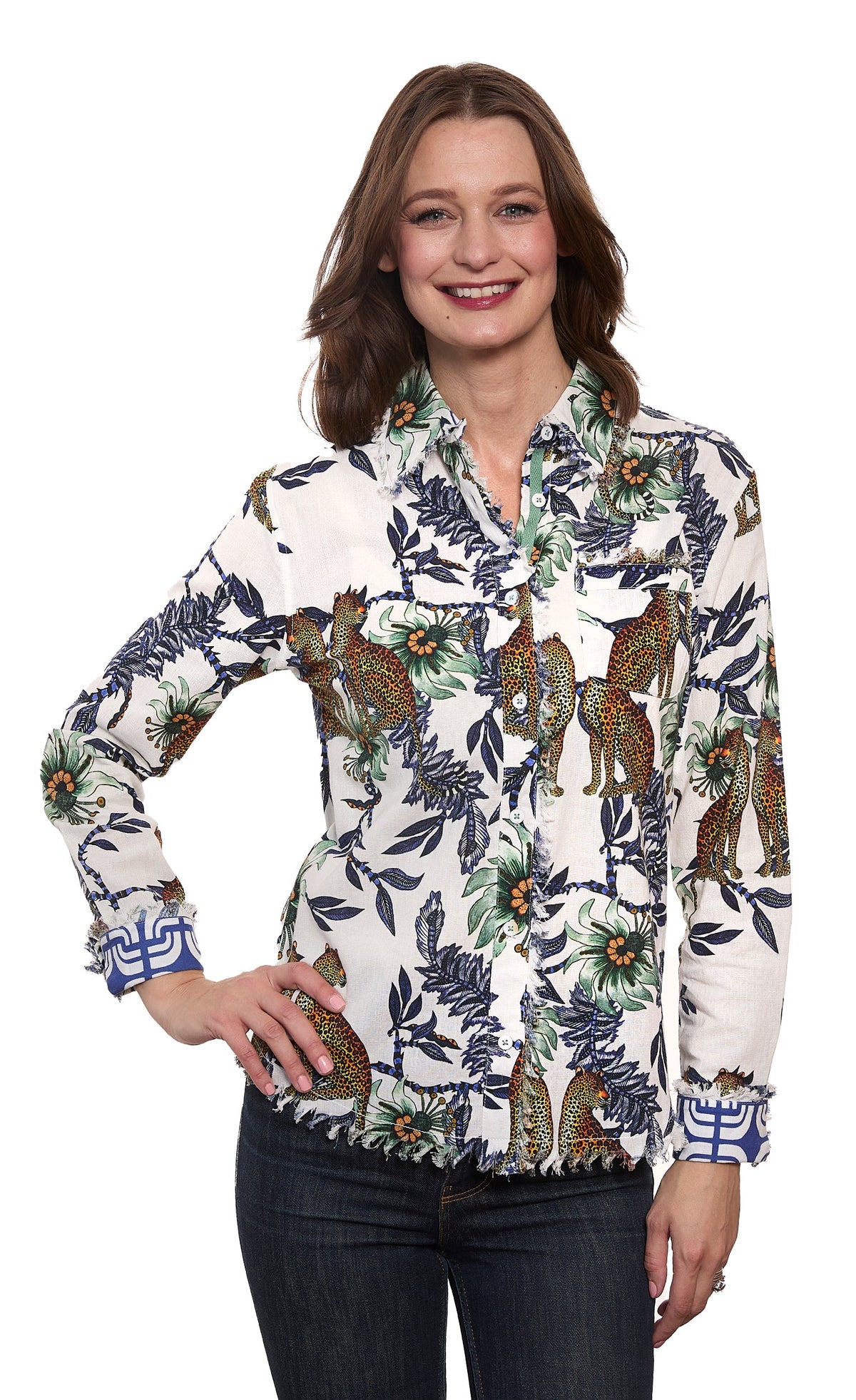 Ivory button-up top with cheetah and floral jungle print, ruffled cuffs, long sleeves