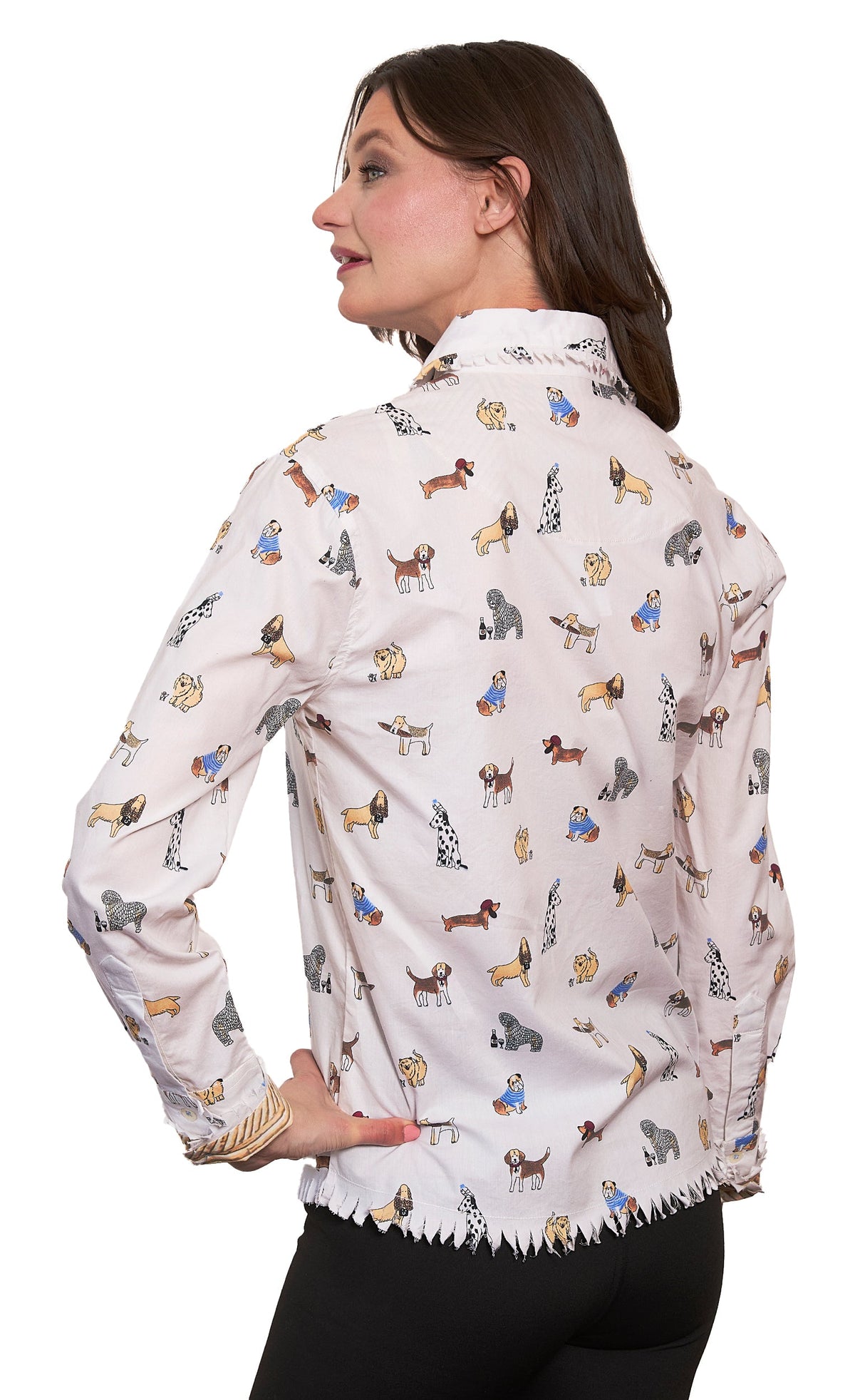 Women’s white dog-print blouse with ruffled collar, button front, and long sleeves
