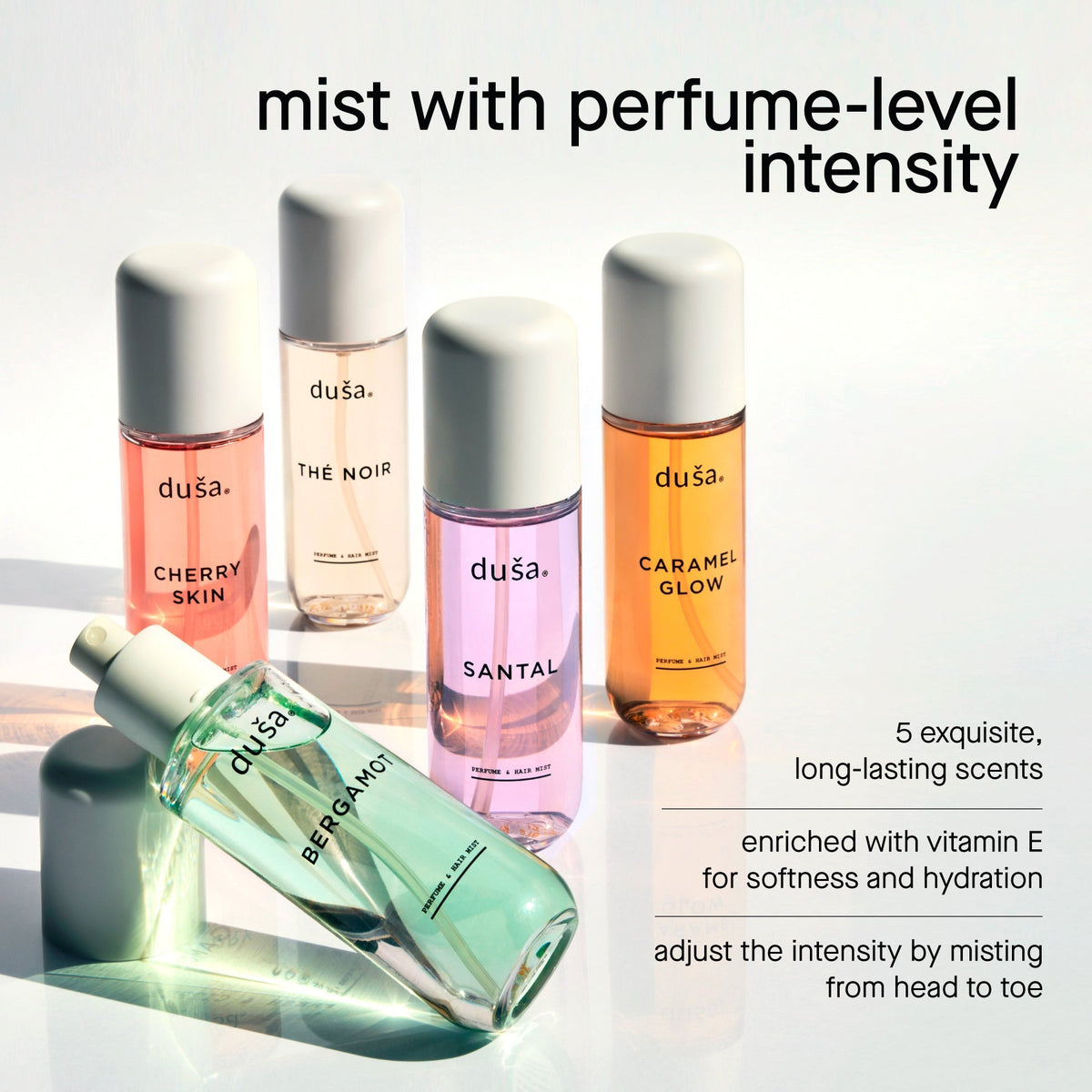 Perfume mist hair and body spray bottles in assorted scents