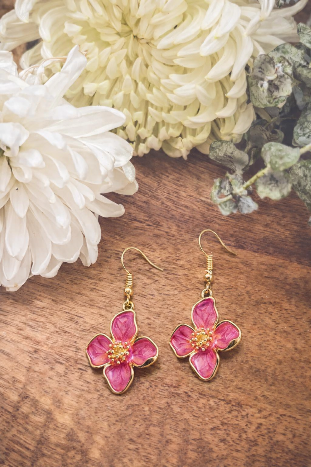 Pink flower drop earrings with gold hooks, dangling five-petal design