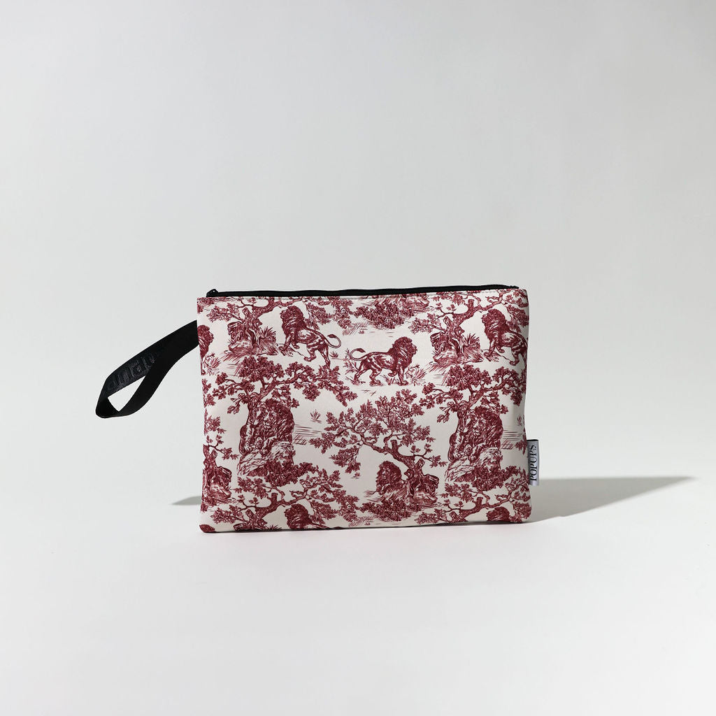 Maroon and white toile laptop sleeve with zip top and black wrist strap