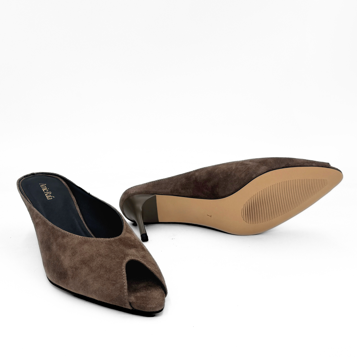 Brown suede peep-toe mule with pointed toe and high stiletto heel, side view