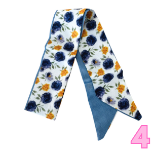 Women’s printed scarf in white with navy blue flowers and small yellow accents