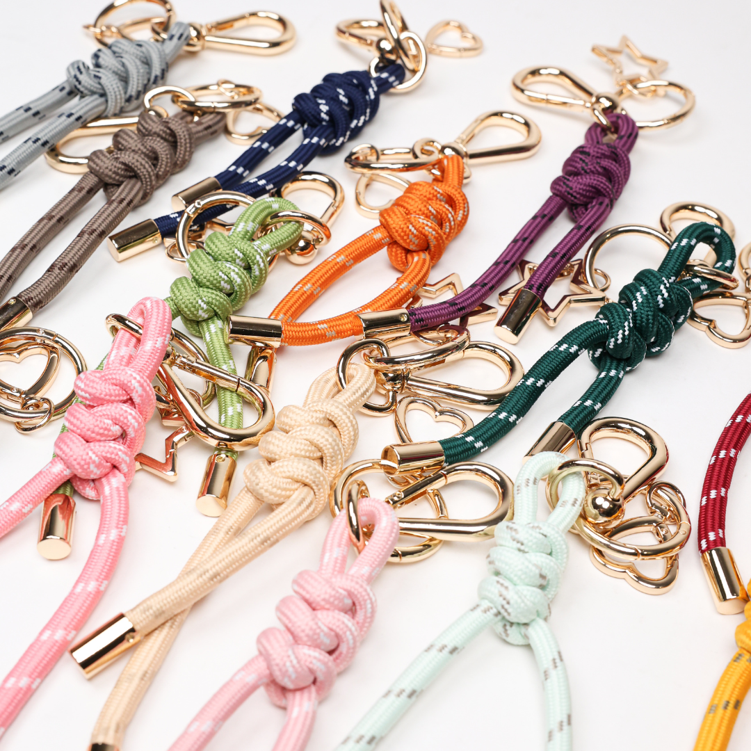Paracord key chains bundle with gold-tone rings and small star charms