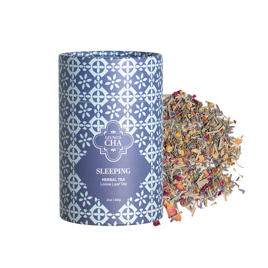 Blue patterned sleeping herbal tea tin with “Sleeping Herbal Tea” loose leaf label