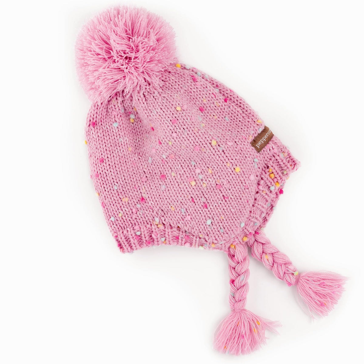 Side view of a pink knit earflap hat with multicolor flecks and braided ties