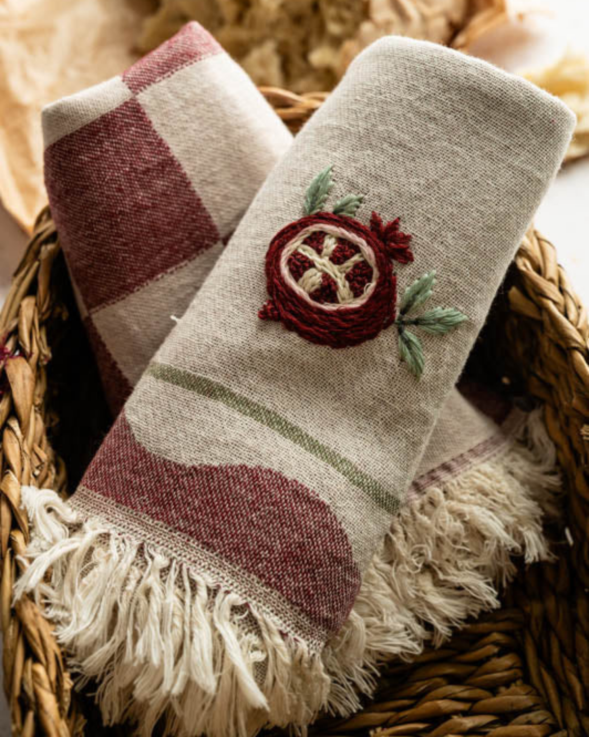 Hand-stitched towel set, beige towel with maroon stripe band, pomegranate stitch, fringe