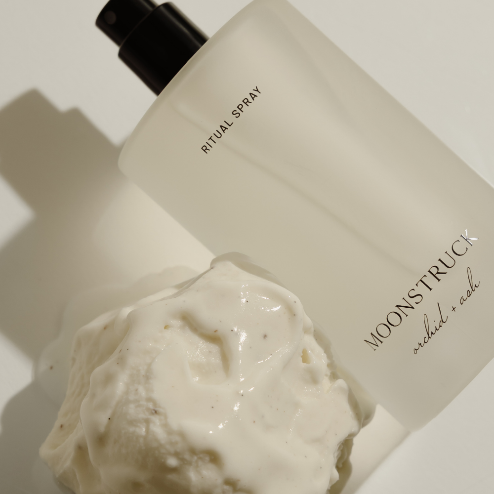 MOONSTRUCK ritual spray bottle with thick white cream swirl