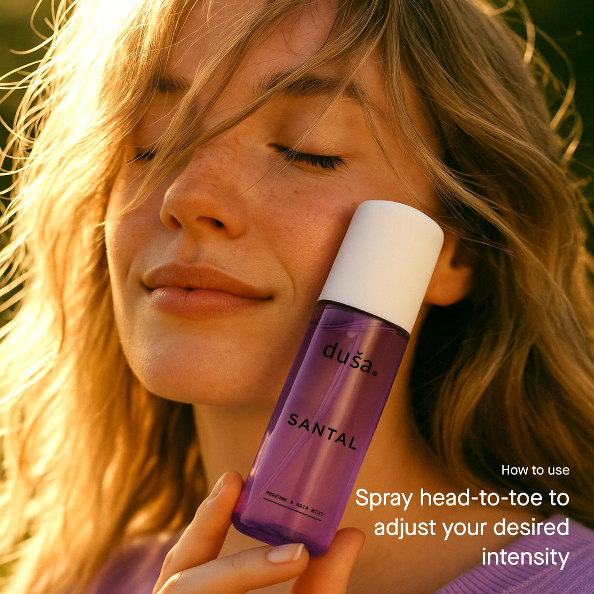 SANTAL perfume mist bottle with white cap and purple liquid