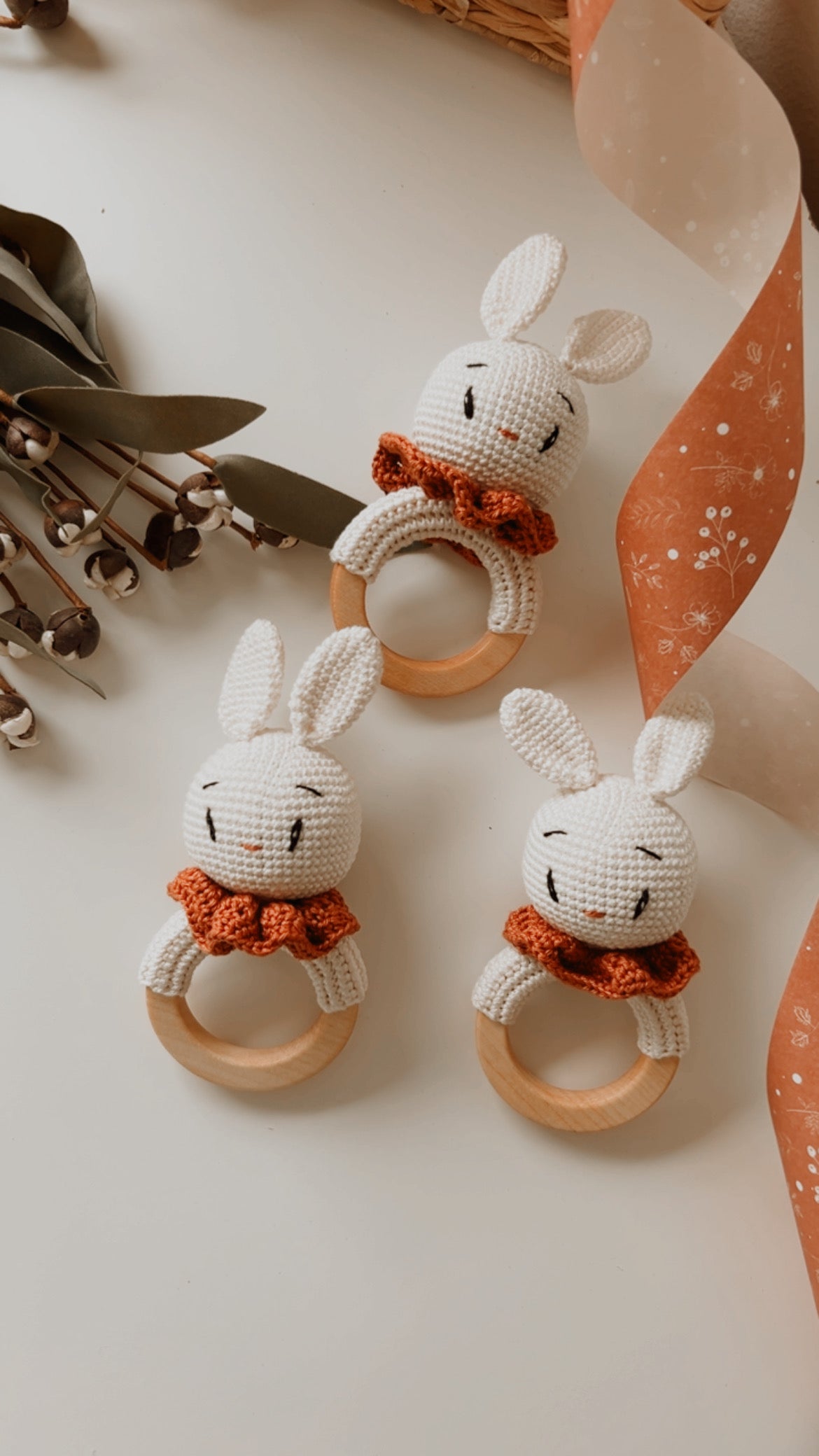 Bunny rattle teether set of three crocheted white bunnies with orange scarves and rings