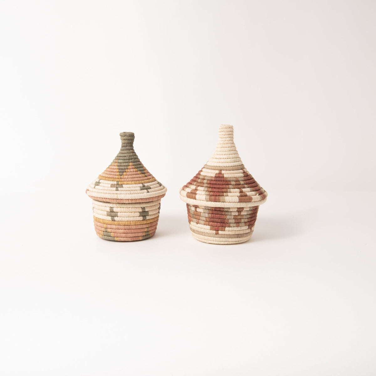 Two woven lidded coffee baskets, striped weave in neutral and reddish-brown tones