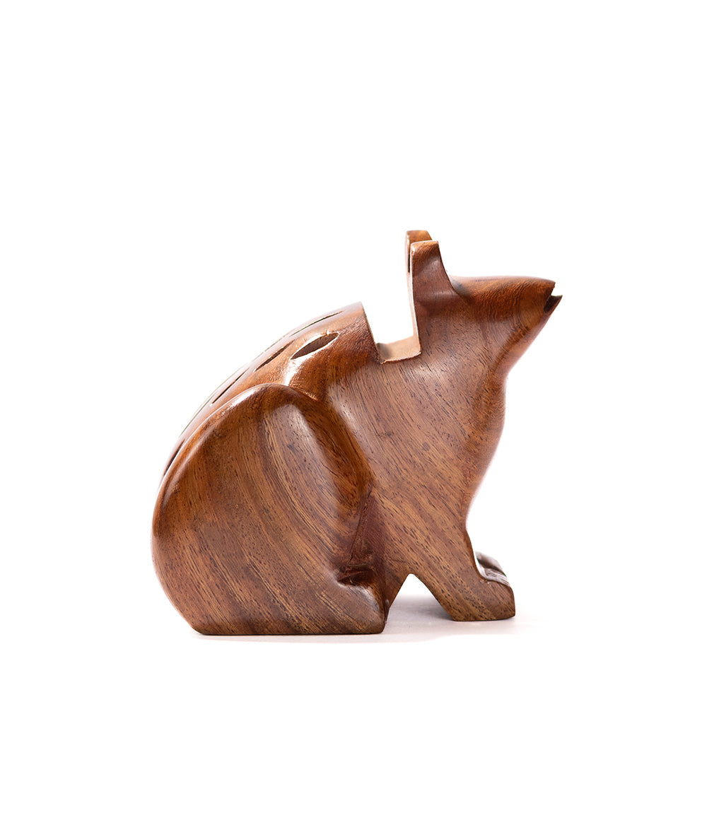 Hand-carved wooden frog eyeglass holder stand, side profile, brown wood