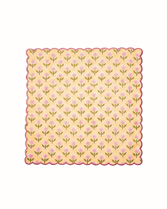 Butter yellow scalloped napkin with pink and green floral blockprint and stitched border