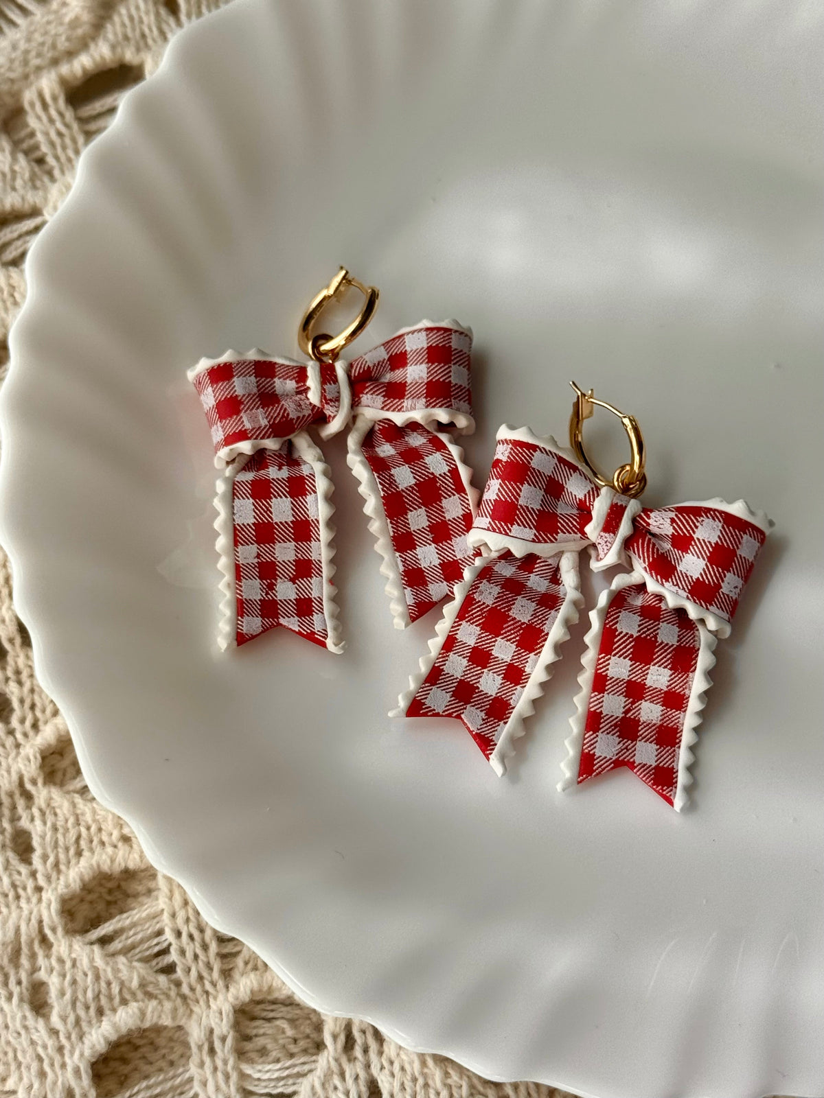 Red gingham bow earrings with gold hoop hooks