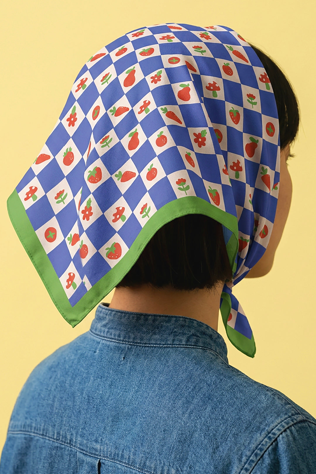 Cotton bandana head scarf, blue checker pattern with green trim, back view