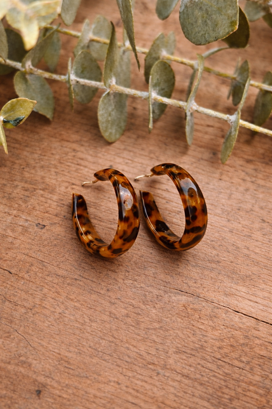 Leopard print tortoiseshell hoop earrings with curved round profile