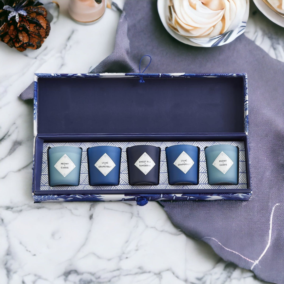 Mediterranean candle gift set in blue tray box with five labeled candles