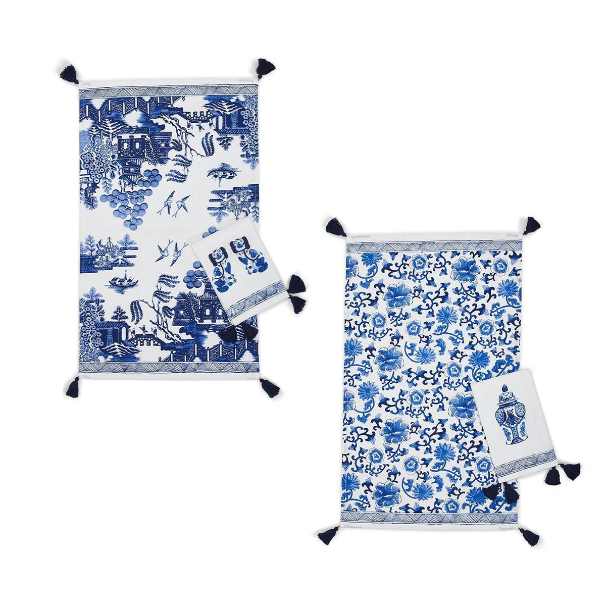 Set of blue and white printed tea towels with navy tassel corners