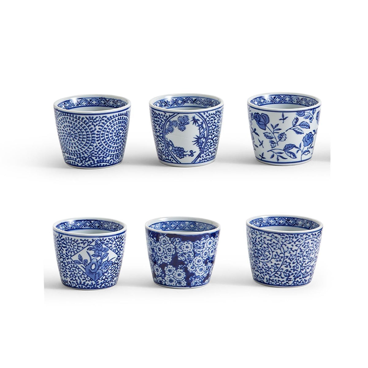 Six small blue-and-white ceramic cachepots with assorted chinoiserie patterns