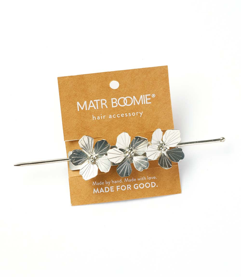 Silver-tone hair pin with five white and gray flower appliques on a straight bar