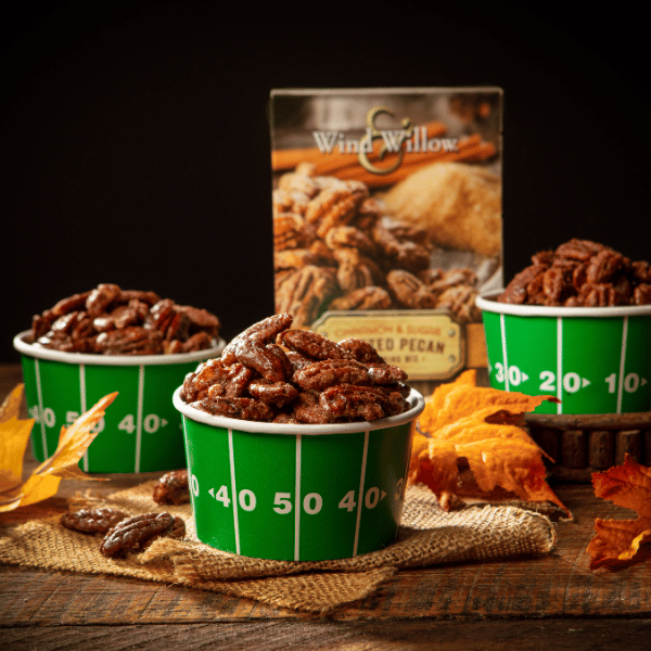 Cinnamon & sugar roasted pecan seasoning mix with pecans in green cups