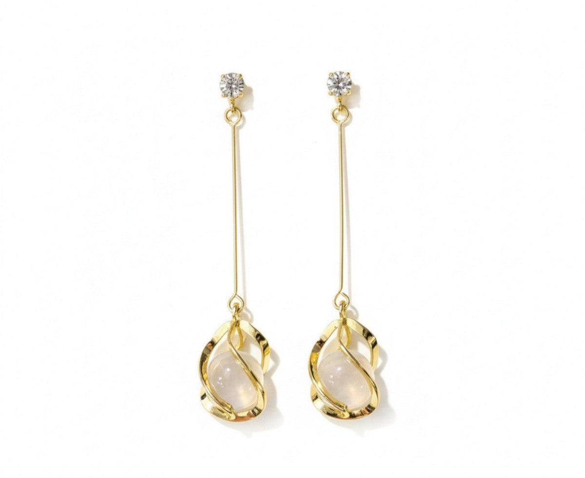 Gold-plated drop earrings with oval cat-eye stones and crystal studs