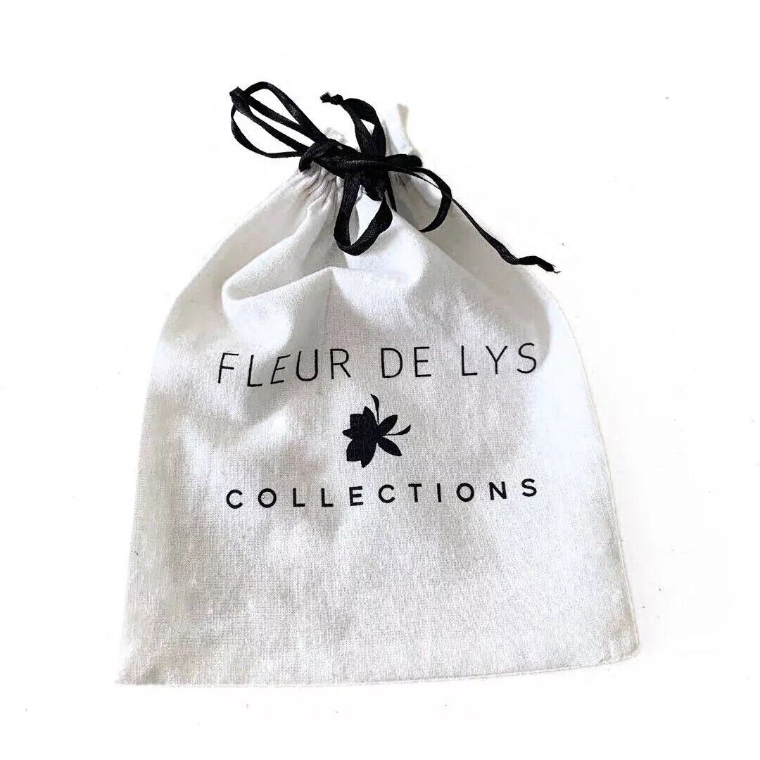 Gold leaf drop hook earrings storage pouch, white fabric with black drawstring
