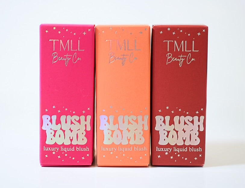 Three boxed liquid blush shades in pink, orange, and deep red.