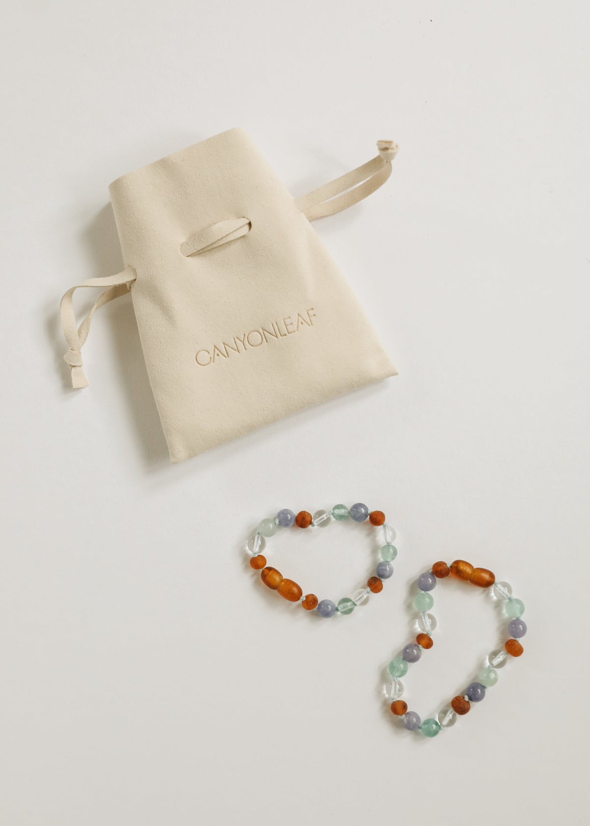 Canyonleaf pouch with multicolor round bead bracelet/anklet, orange and pale blue