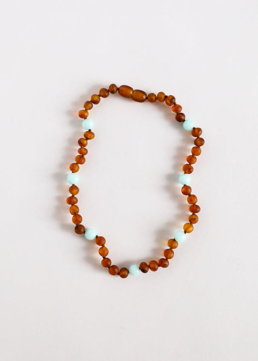 Cognac amber bead necklace with pale blue amazonite accent beads