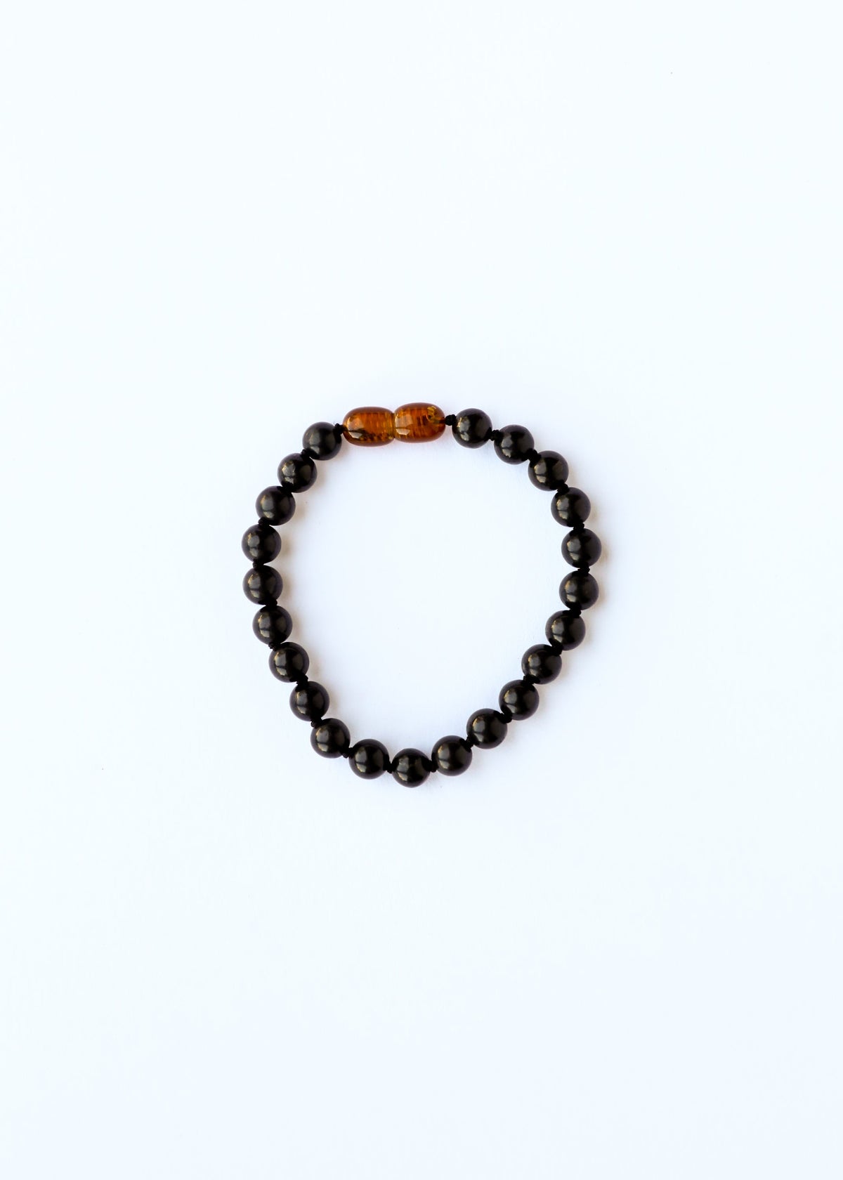 Black shungite bead bracelet or anklet with amber-toned center beads