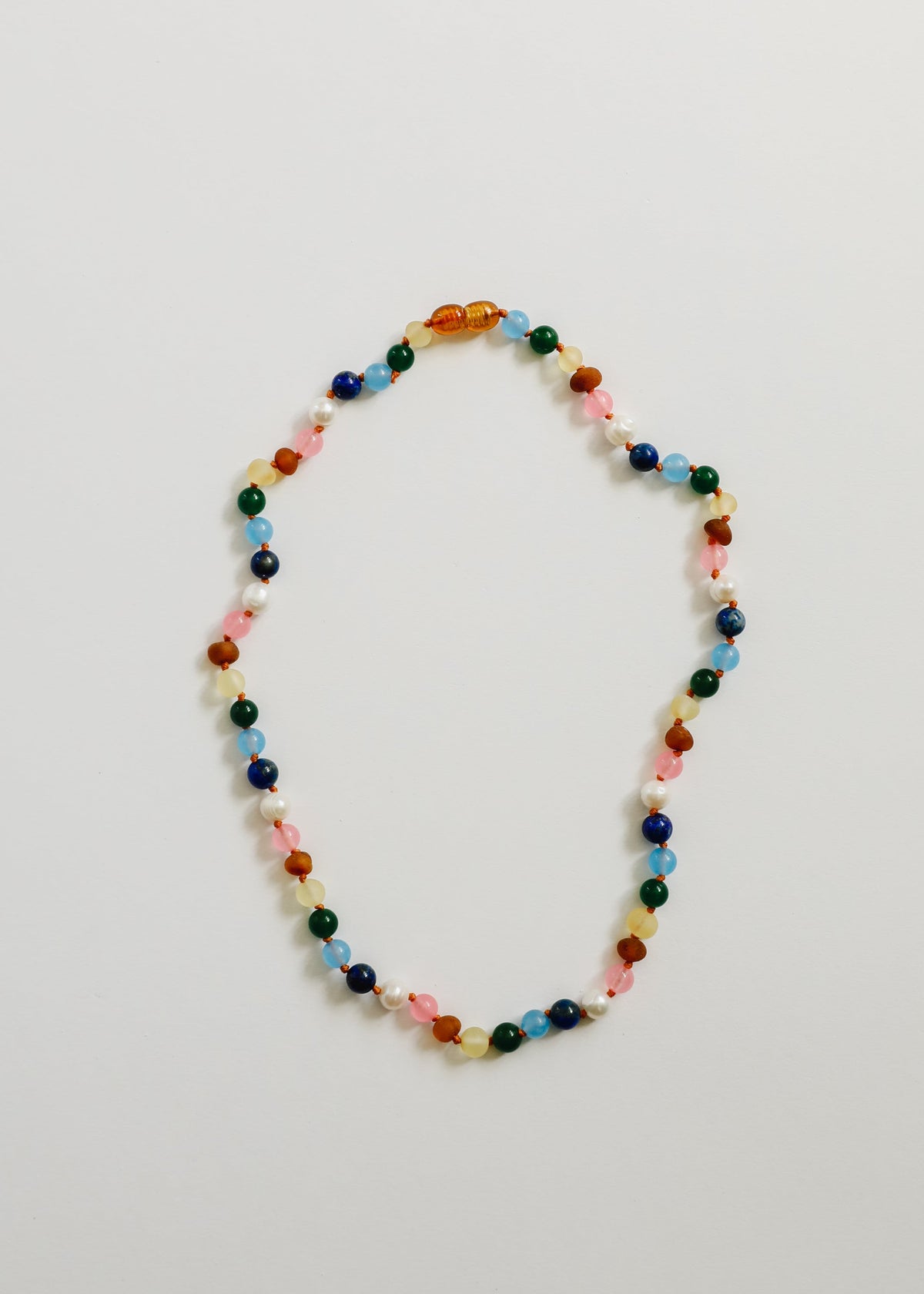 Multicolor gemstone beaded necklace with pearl-white accent beads
