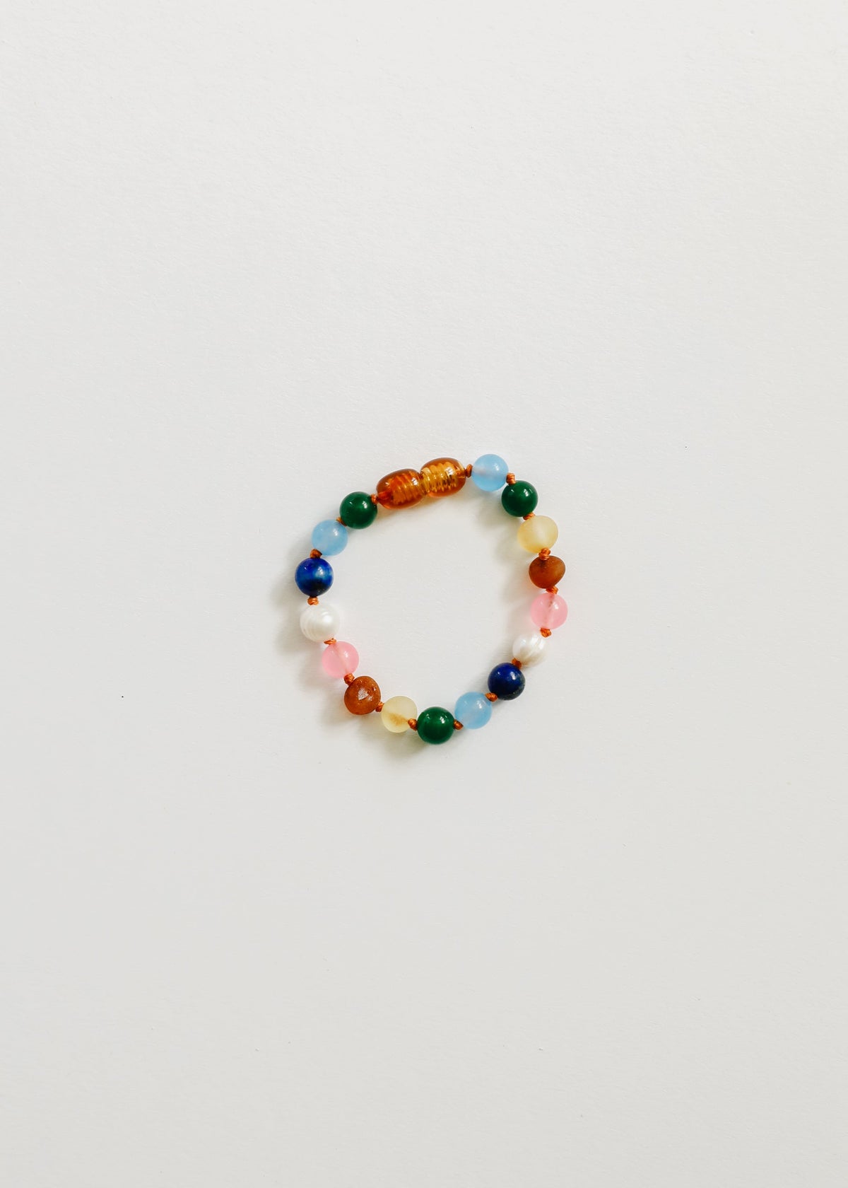 Beaded bracelet with orange, green, blue, white, and pink stones and pearls
