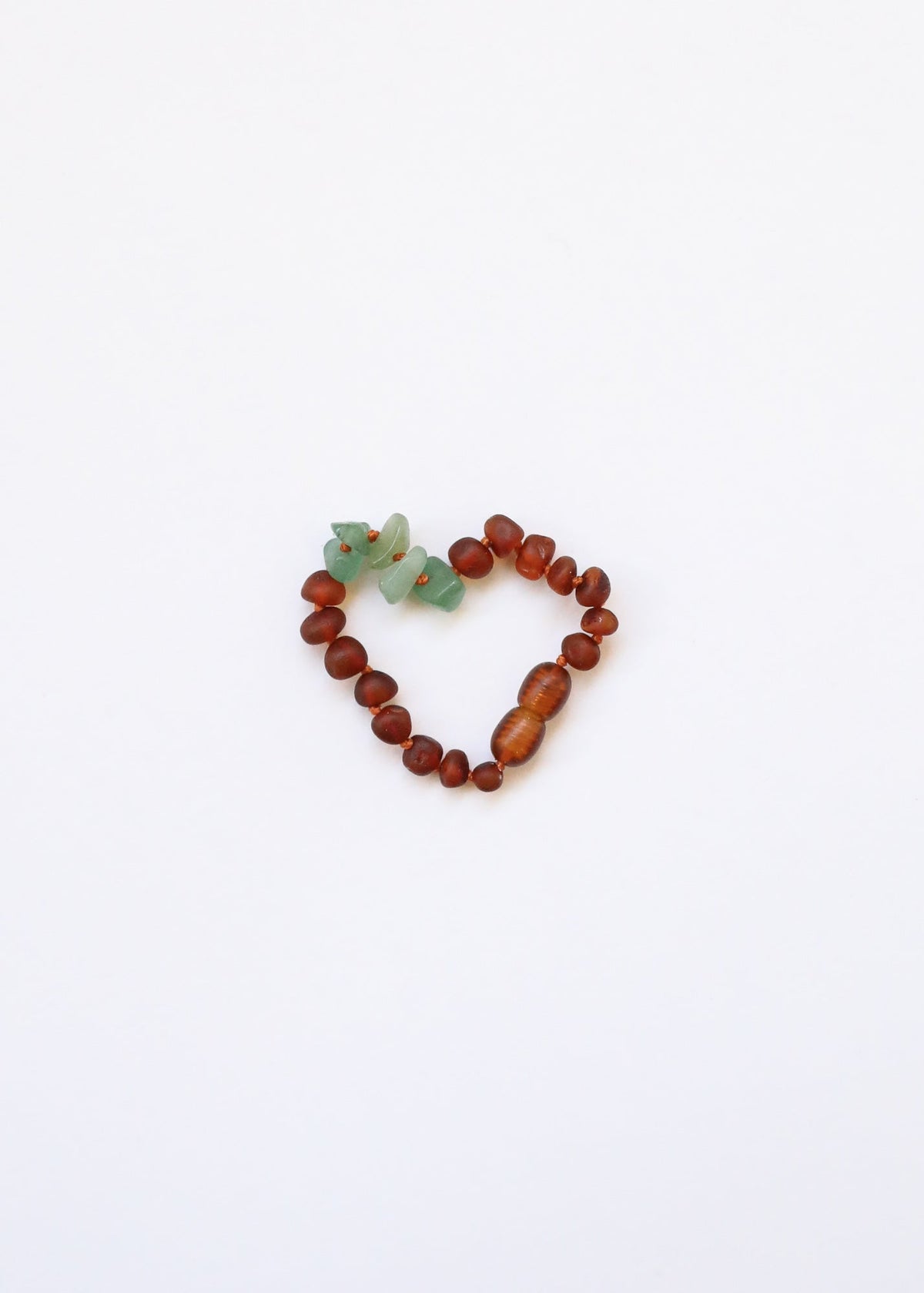 Raw cognac amber bead bracelet with green aventurine accents, stretch fit