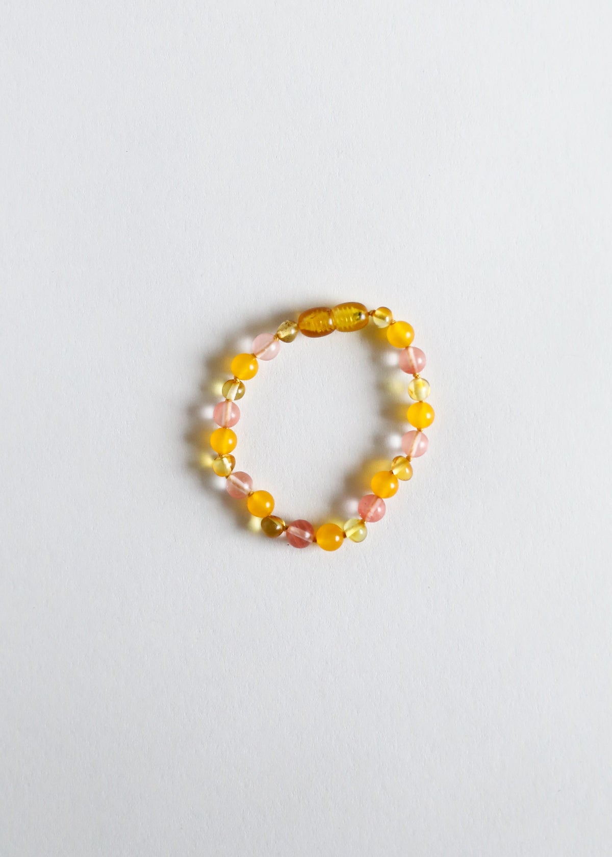 Honey amber and pink beaded bracelet/anklet with gold-toned spacer beads