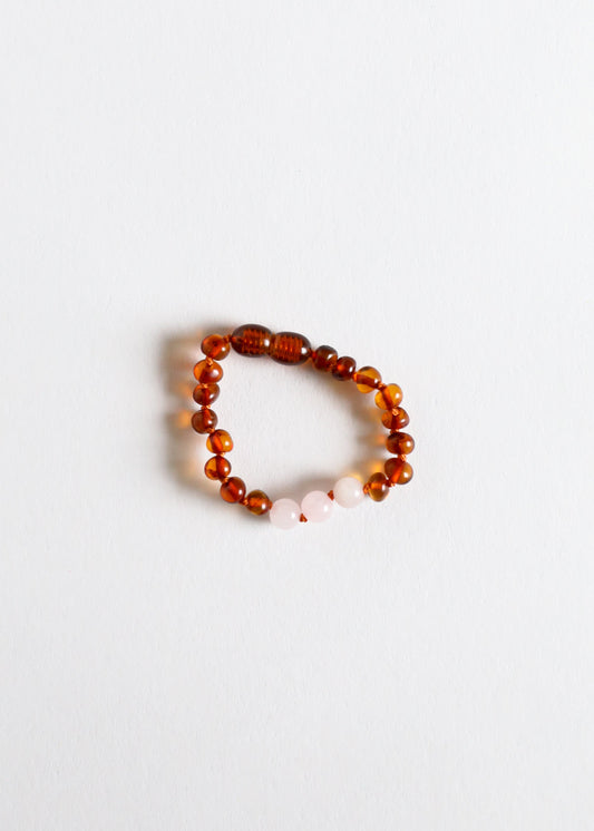 Polished cognac amber beaded bracelet with white rose quartz accents
