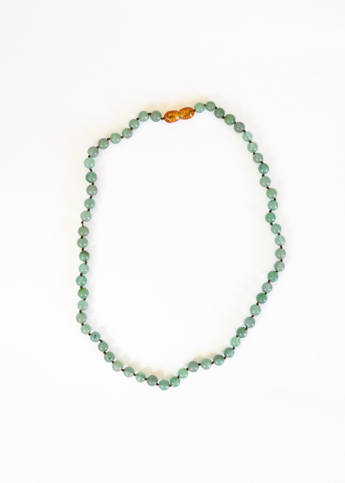 Aventurine bead necklace with central amber/gold bead detail