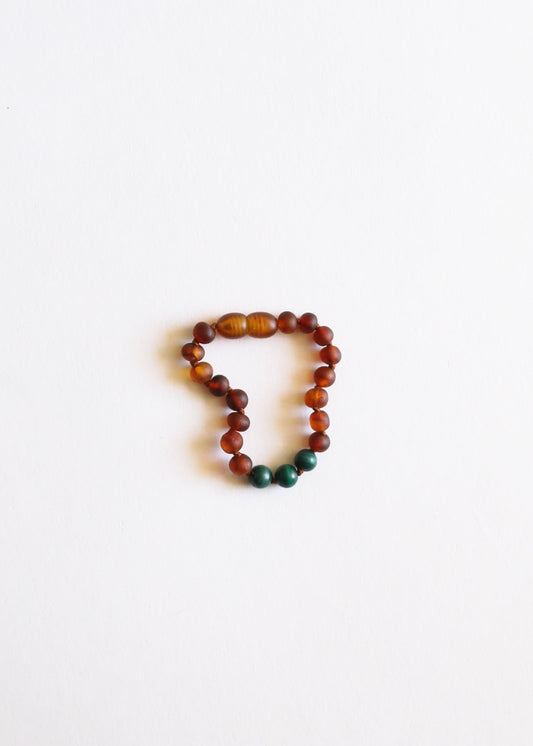 Amber and malachite bead bracelet, round dark cognac beads with green accents