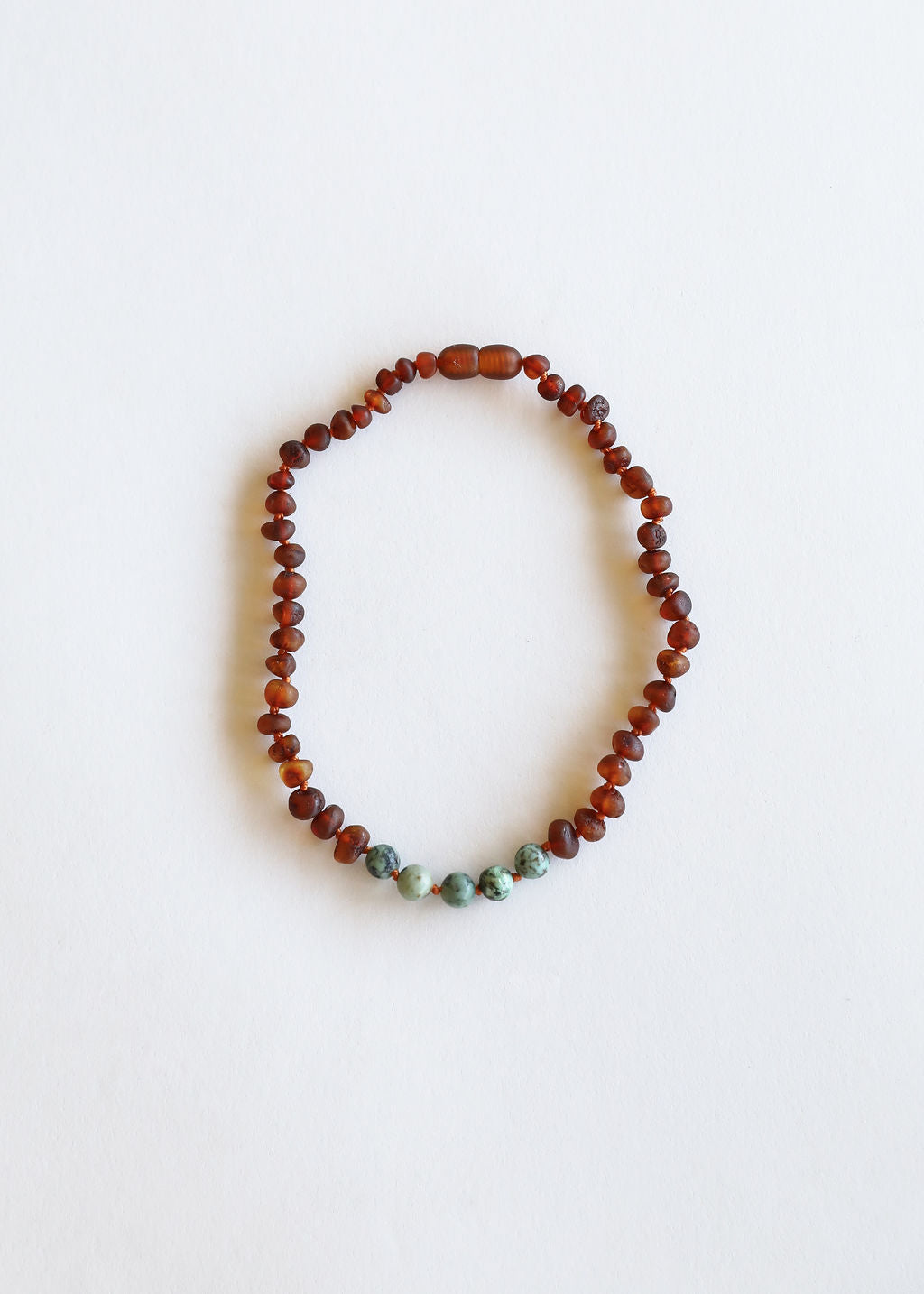 Turquoise and red-brown beaded necklace, single strand with beadwork detail